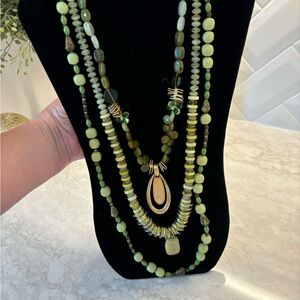 3 Green Chico’s necklaces.